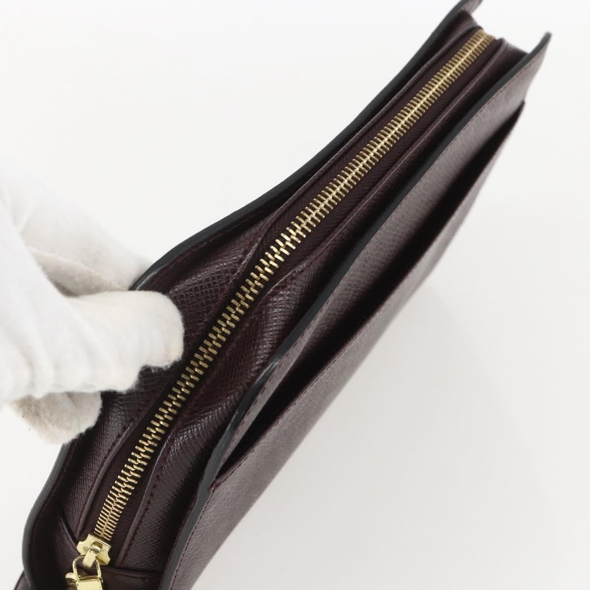 Louis Vuitton Pochette Baikal Clutch Taiga Leather Brown Leather Clutche & Pouche Bag
