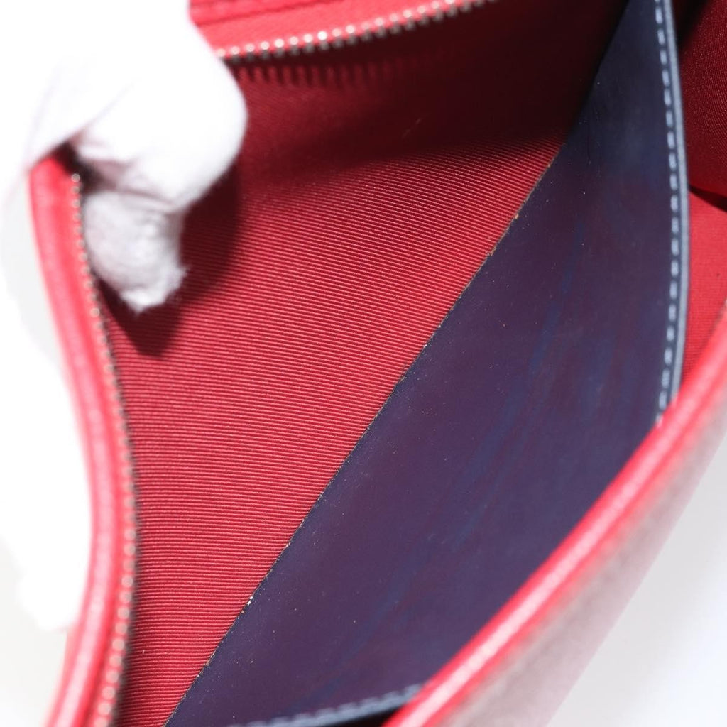 Louis Vuitton Pochette Voyage Taiga Leather Red Leather Clutche & Pouche Bag