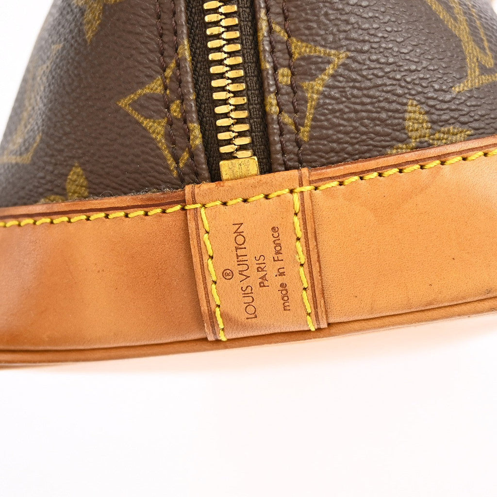 Louis Vuitton Alma Handbag Monogram Canvas Brown Canvas Handbag