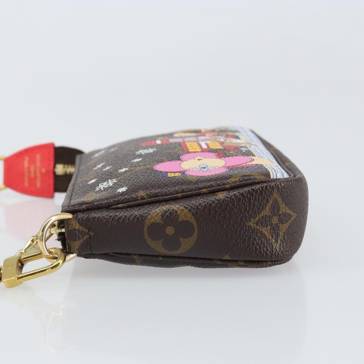 Louis Vuitton Pochette Accessoires Limited Edition Vivienne Xmas Monogram Canvas Brown Canvas Clutche & Pouche Bag