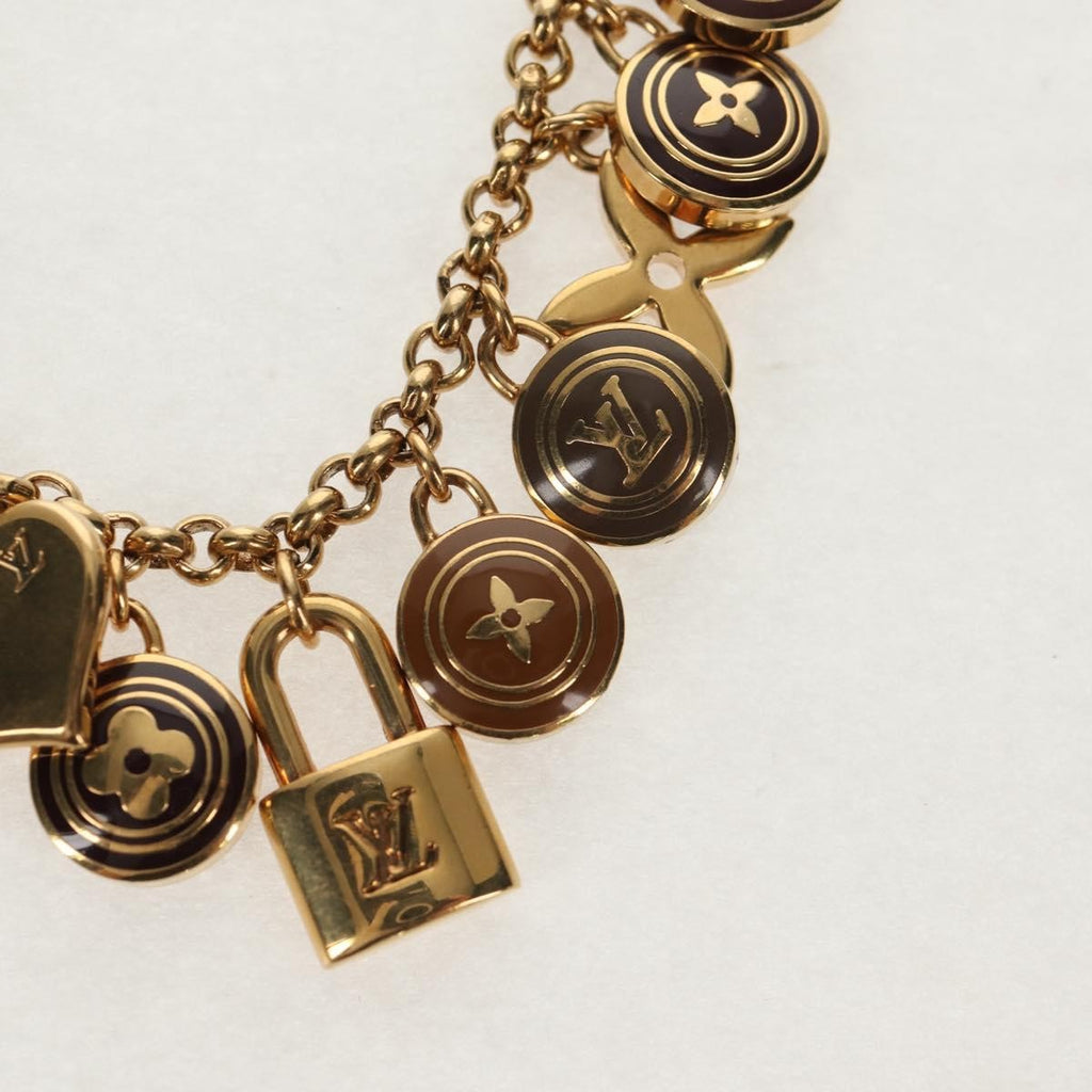 Louis Vuitton Pastilles Bag Charm And Key Holder Metal And Enamel Gold Metal Charms And Keychains Accessory