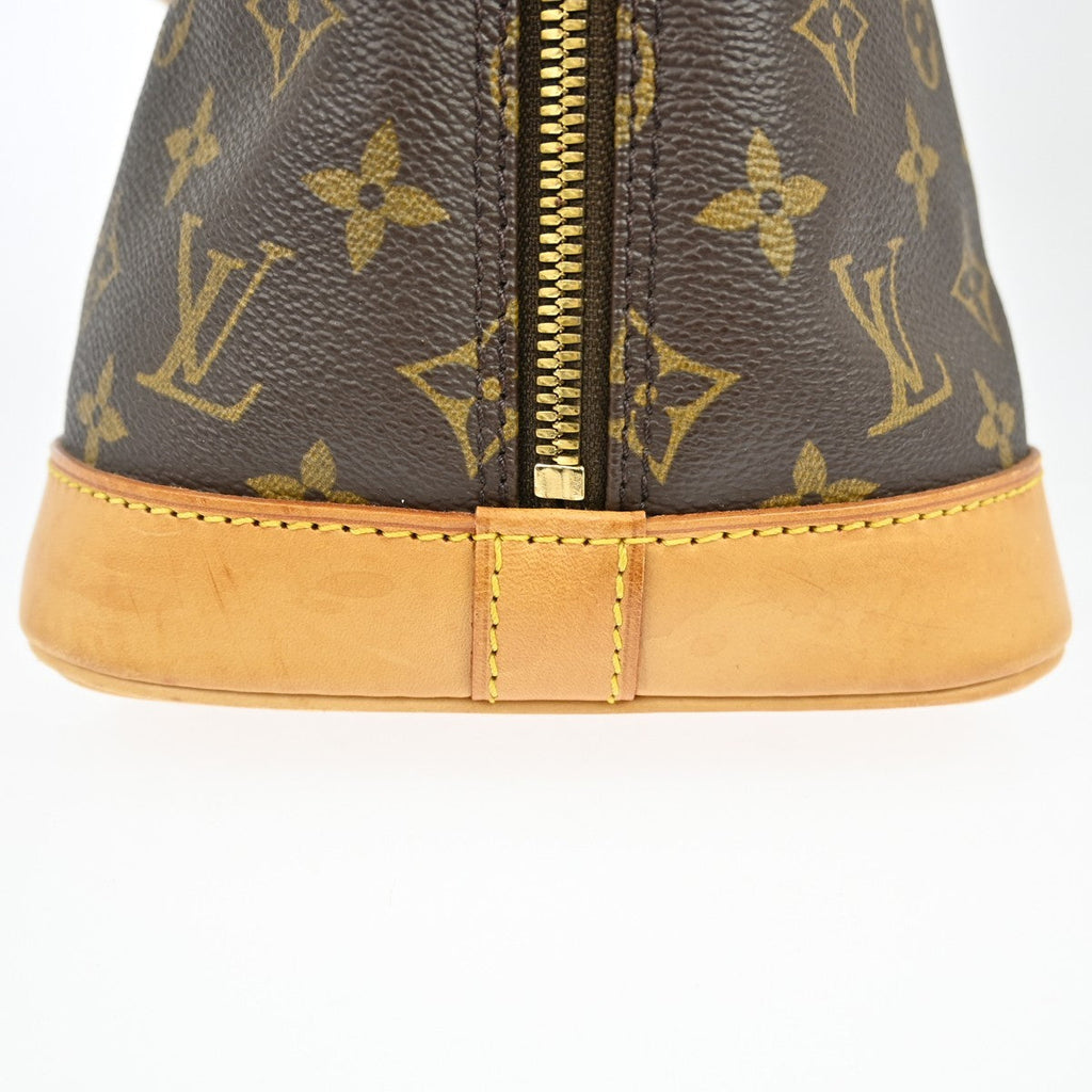 Louis Vuitton Alma Handbag Monogram Canvas Brown Canvas Handbag