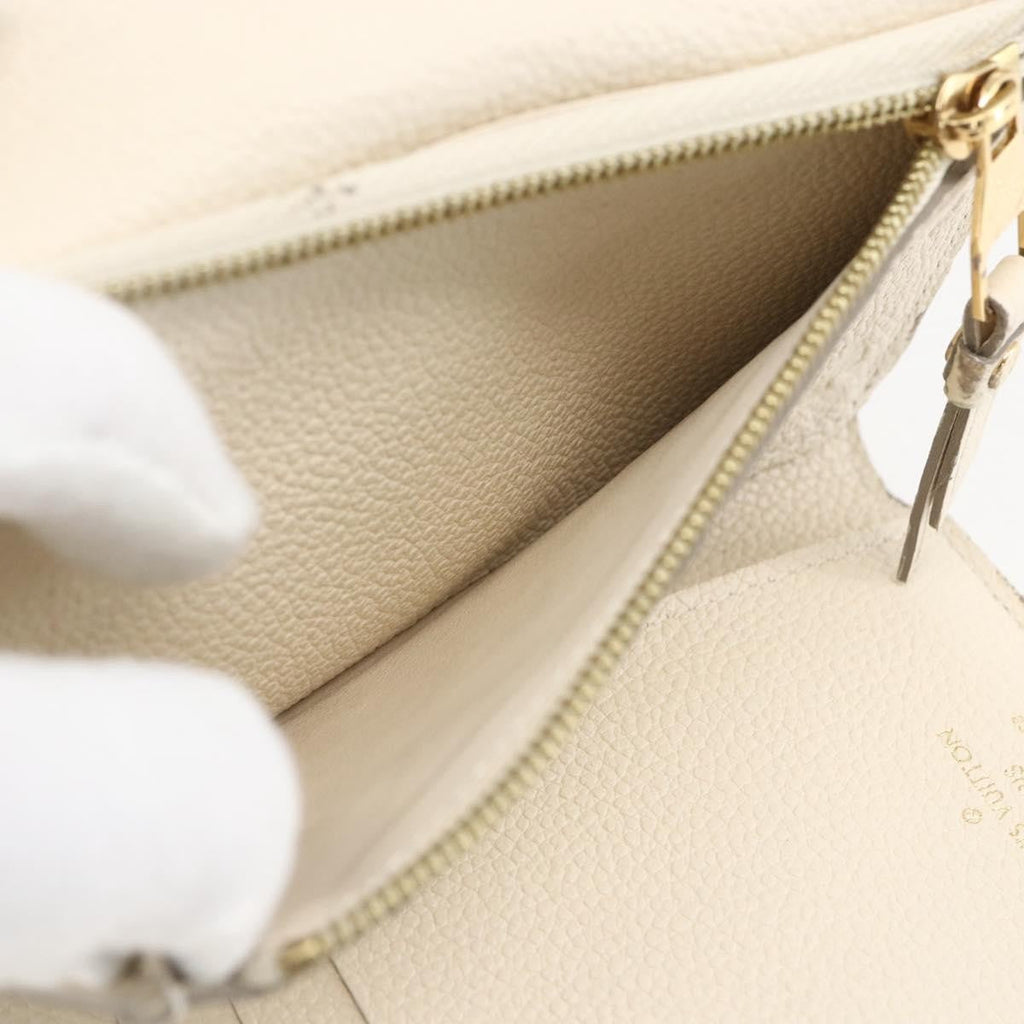 Louis Vuitton Zoe Wallet Monogram Empreinte Leather Beige Leather Wallets Accessory