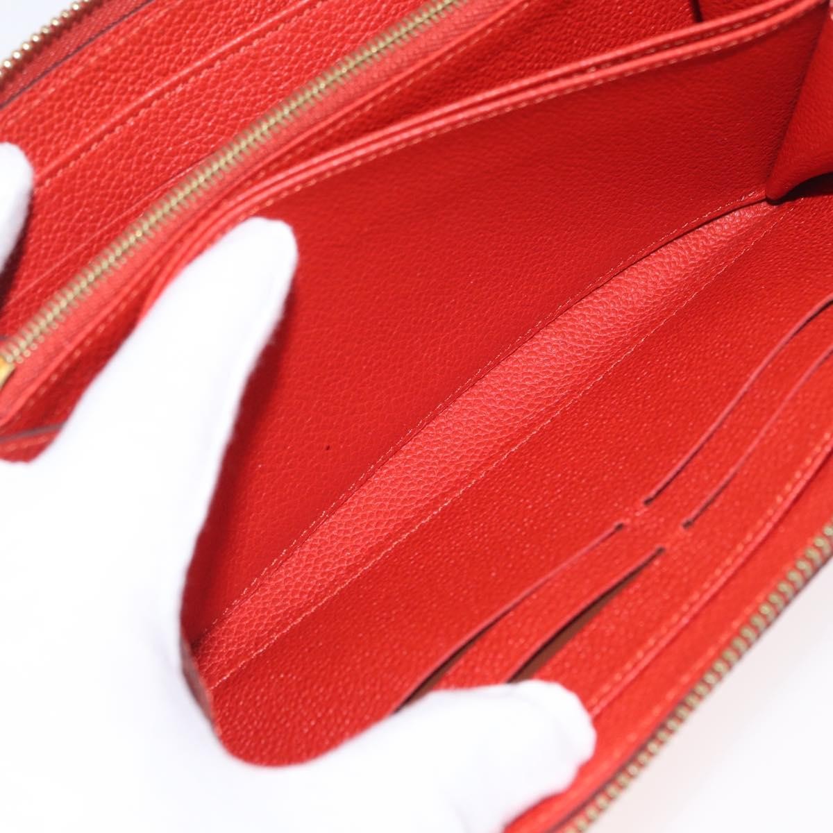 Louis Vuitton Portefeuille Zippy Monogramme Empreinte Monogramme Empreinte Orange Leather Wallets Accessory