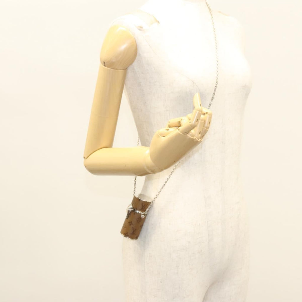 Louis Vuitton Lipstick Case On Chain Reverse Monogram Canvas Brown Canvas Clutche & Pouche Bag