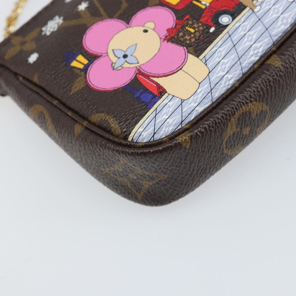 Louis Vuitton Pochette Accessoires Limited Edition Vivienne Xmas Monogram Canvas Brown Canvas Clutche & Pouche Bag