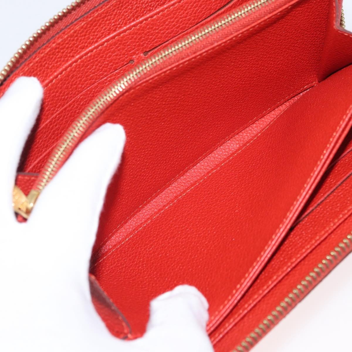 Louis Vuitton Portefeuille Zippy Monogramme Empreinte Monogramme Empreinte Orange Leather Wallets Accessory