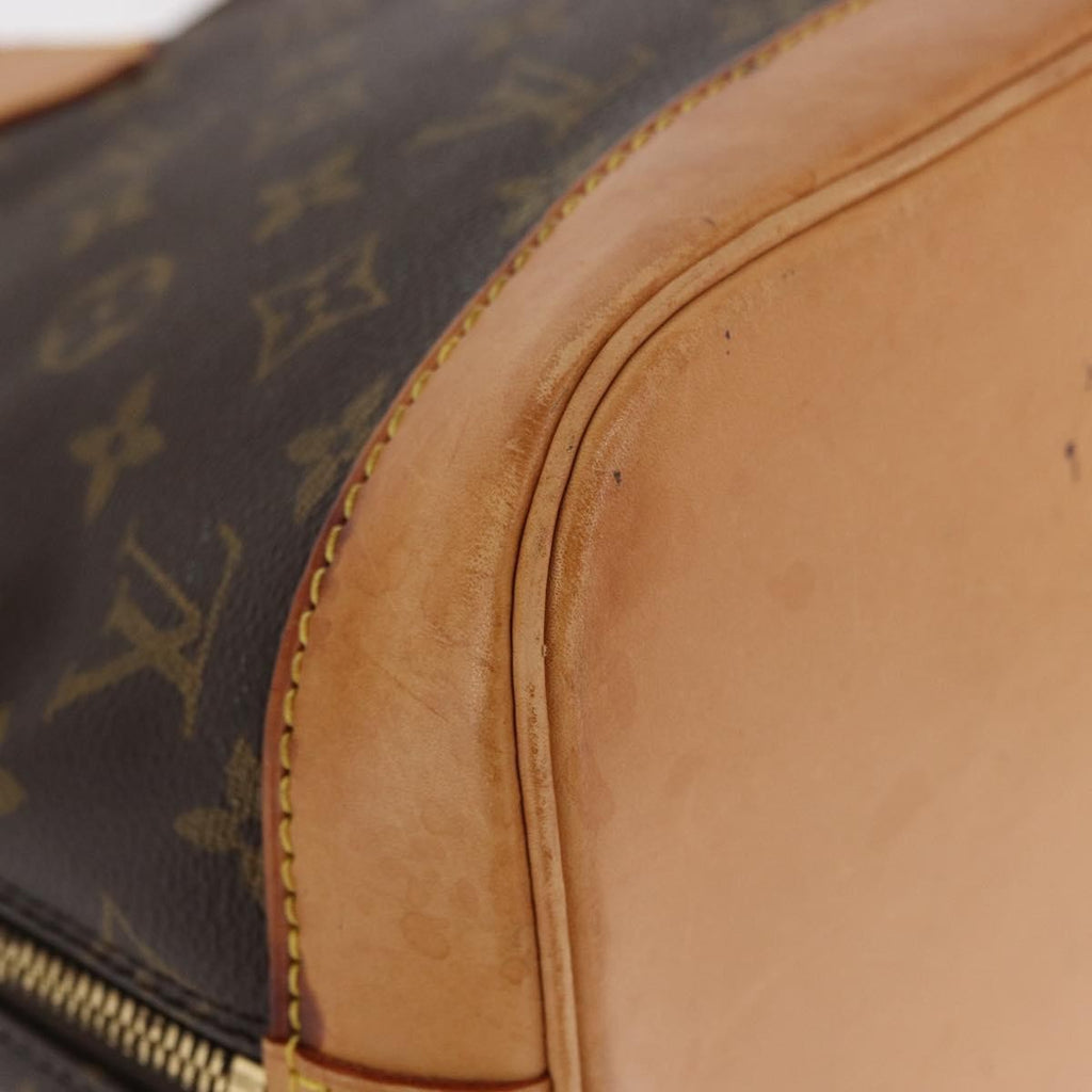 Louis Vuitton Alma Handbag Monogram Canvas Brown Canvas Handbag