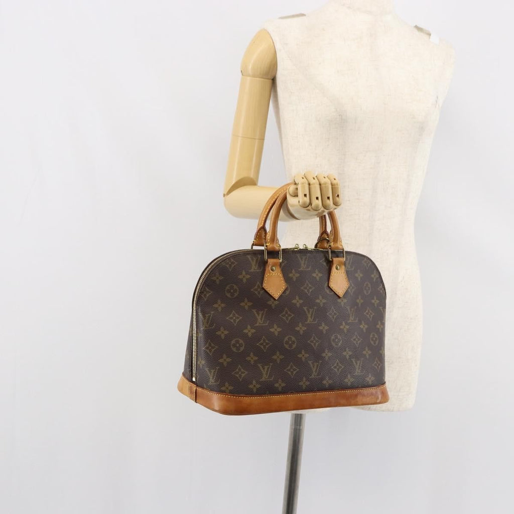 Louis Vuitton Alma Handbag Monogram Canvas Brown Canvas Handbag