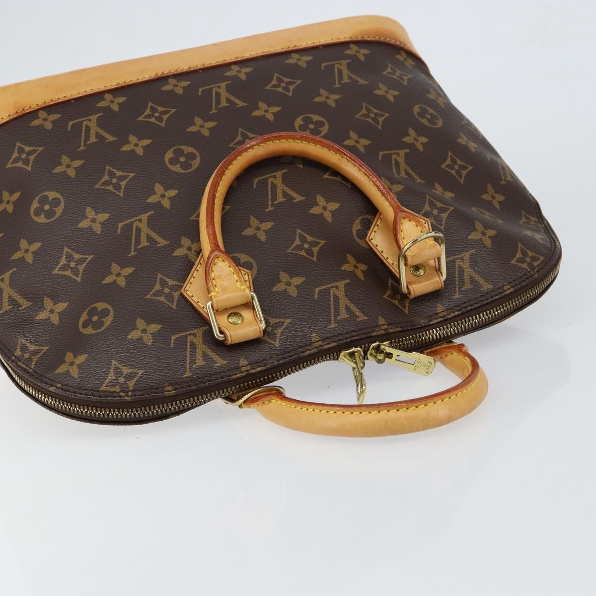 Louis Vuitton Alma Handbag Monogram Canvas Brown Canvas Handbag