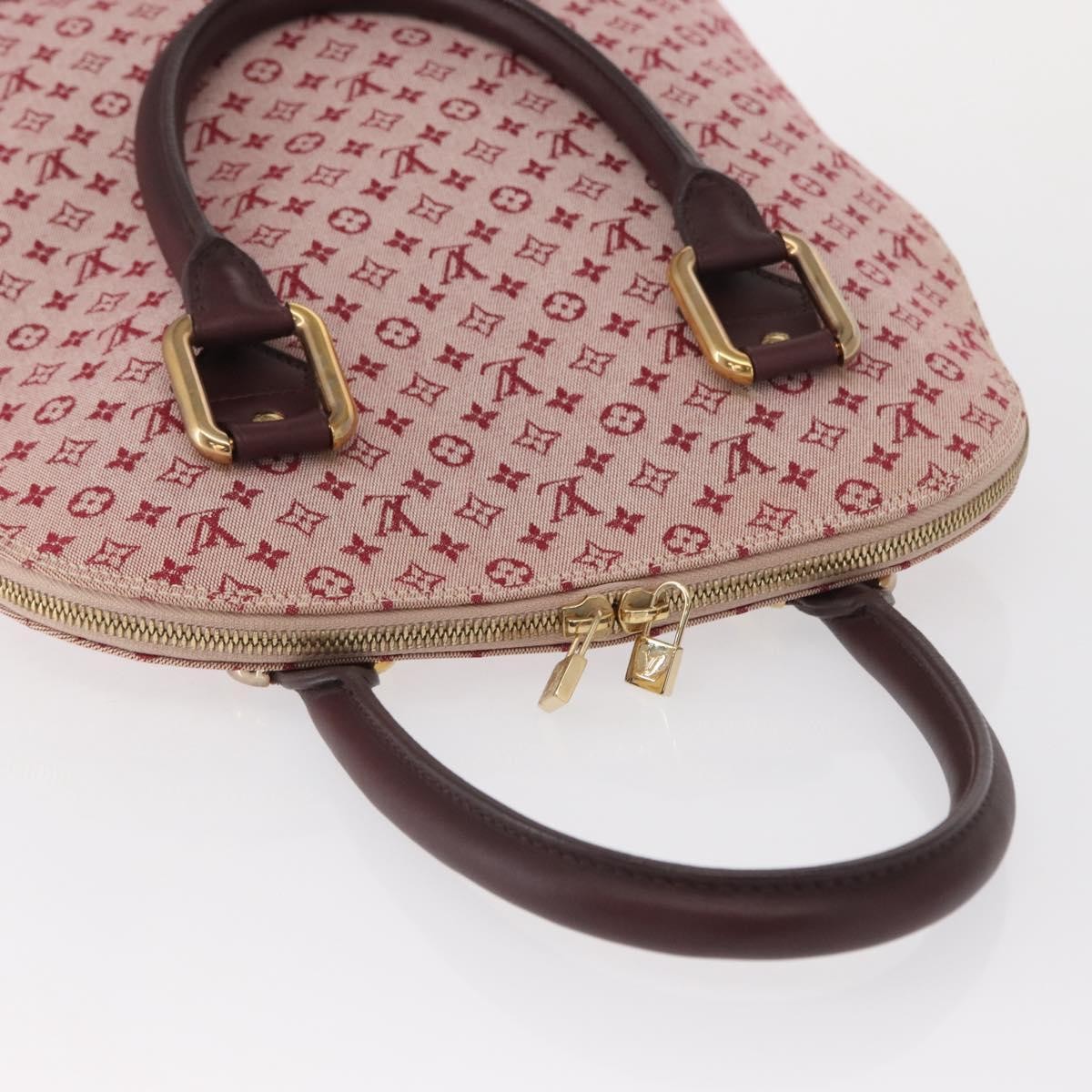 Louis Vuitton Alma Handbag Mini Lin Monogram Red Canvas Handbag