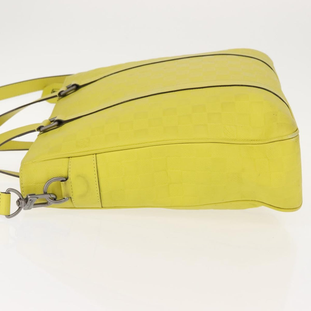 Louis Vuitton Tadao Handbag Damier Infini Leather Yellow Leather Handbag