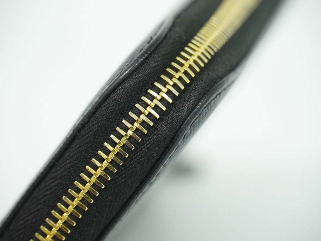Prada Zip Around Tab Wallet Saffiano Leather Black Leather Wallets Accessory