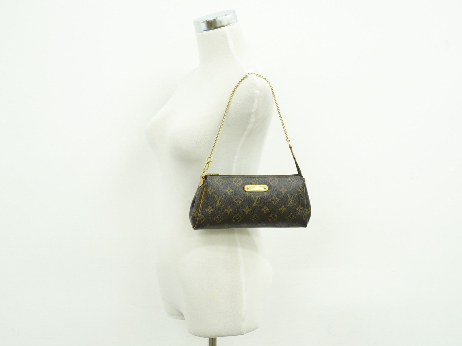 Louis Vuitton Eva Handbag Monogram Canvas Brown Canvas Clutche & Pouche Bag