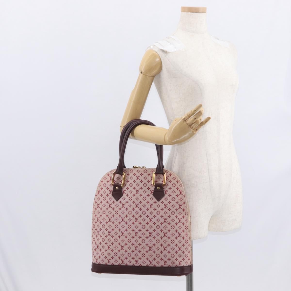 Louis Vuitton Alma Handbag Mini Lin Monogram Red Canvas Handbag