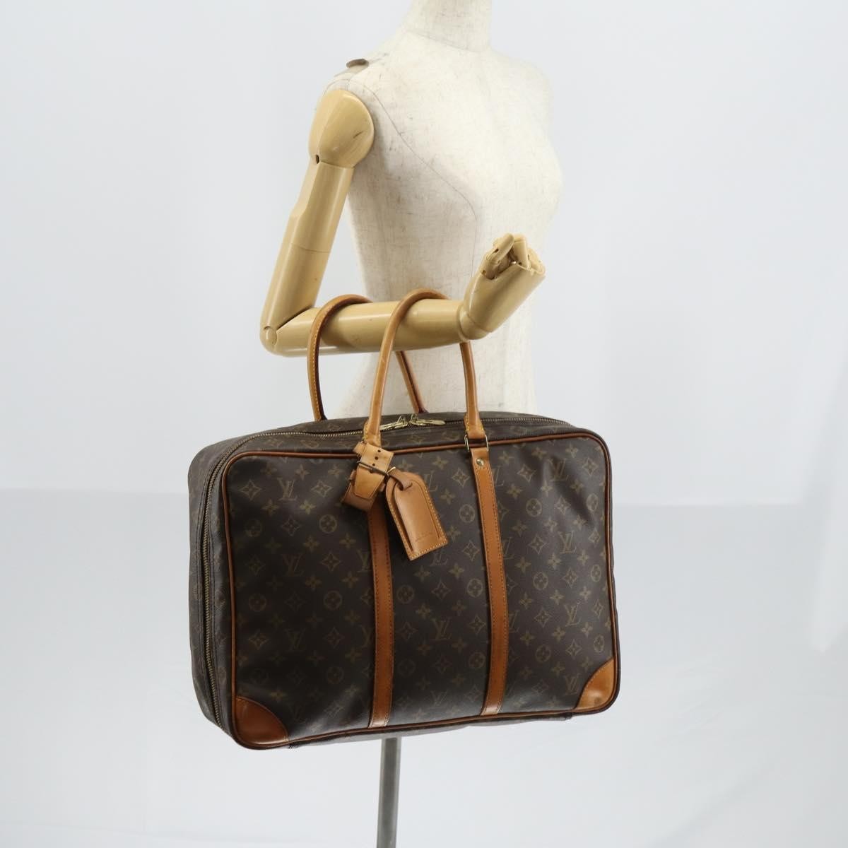 Louis Vuitton Sirius Handbag Monogram Canvas Brown Canvas Travel Bag