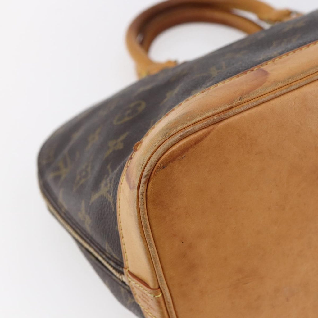 Louis Vuitton Alma Handbag Monogram Canvas Brown Canvas Handbag