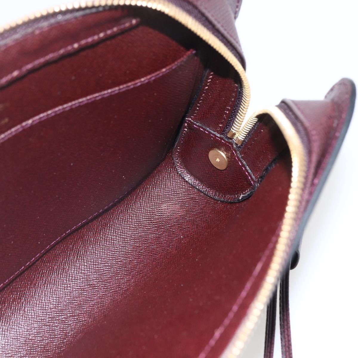 Louis Vuitton Pochette Baikal Clutch Taiga Leather Brown Leather Clutche & Pouche Bag