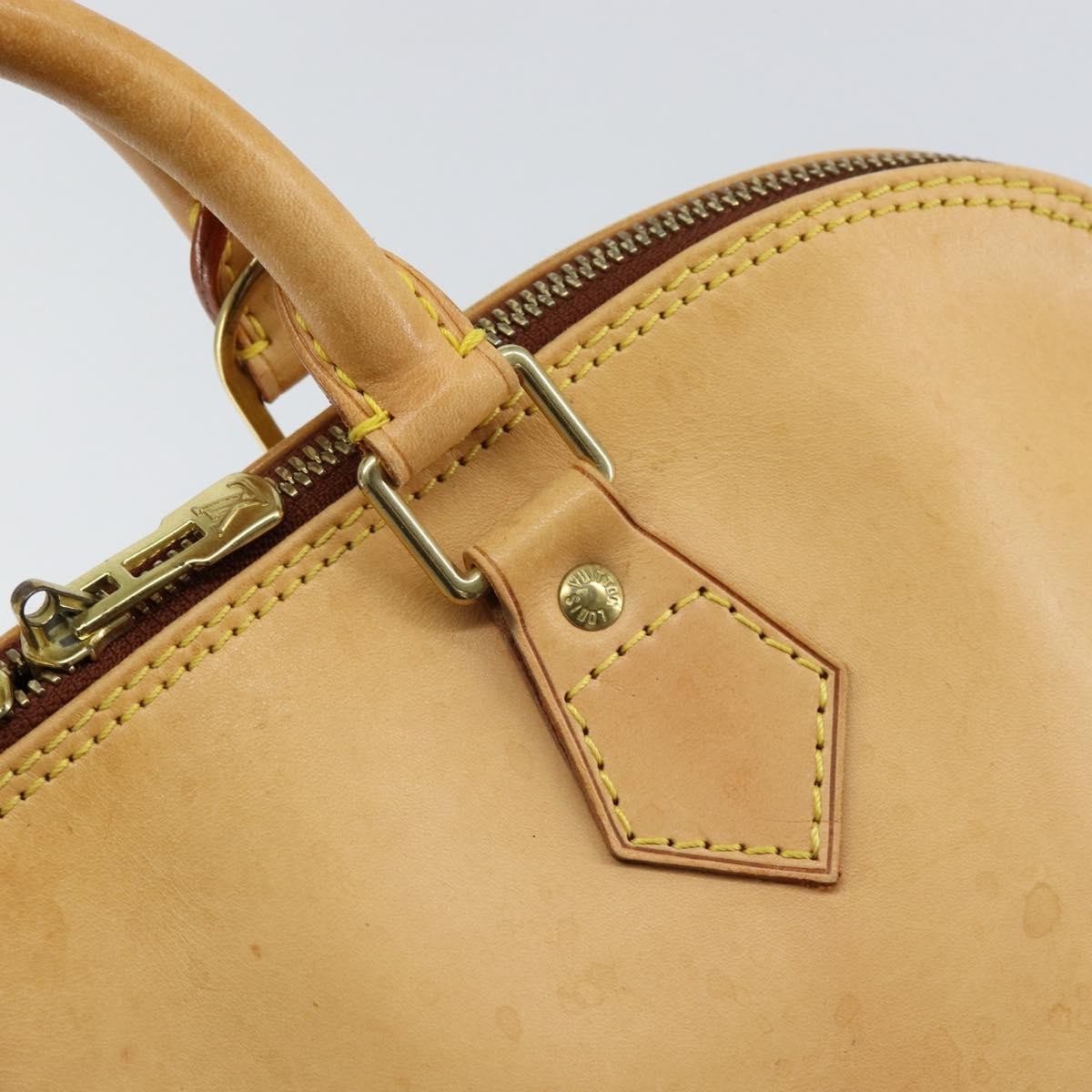Louis Vuitton Alma Handbag Nomade Leather Beige Leather Handbag