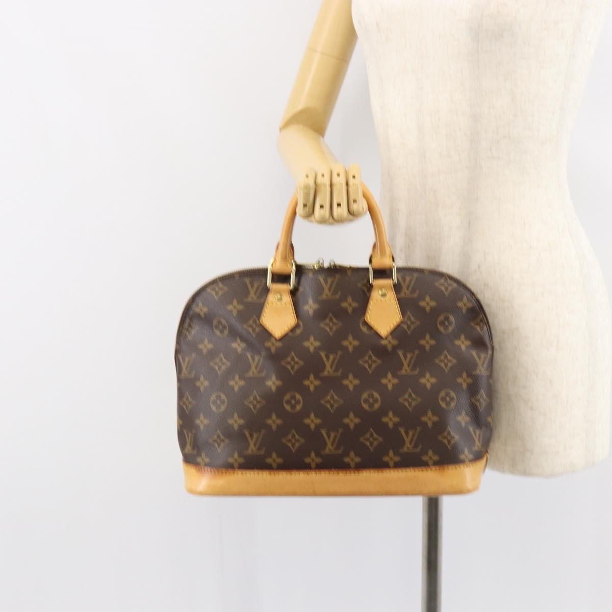 Louis Vuitton Alma Handbag Monogram Canvas Brown Canvas Handbag