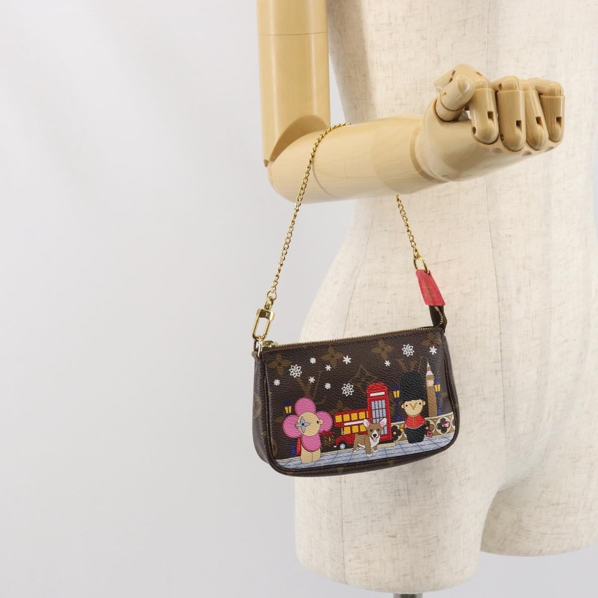 Louis Vuitton Pochette Accessoires Limited Edition Vivienne Xmas Monogram Canvas Brown Canvas Clutche & Pouche Bag