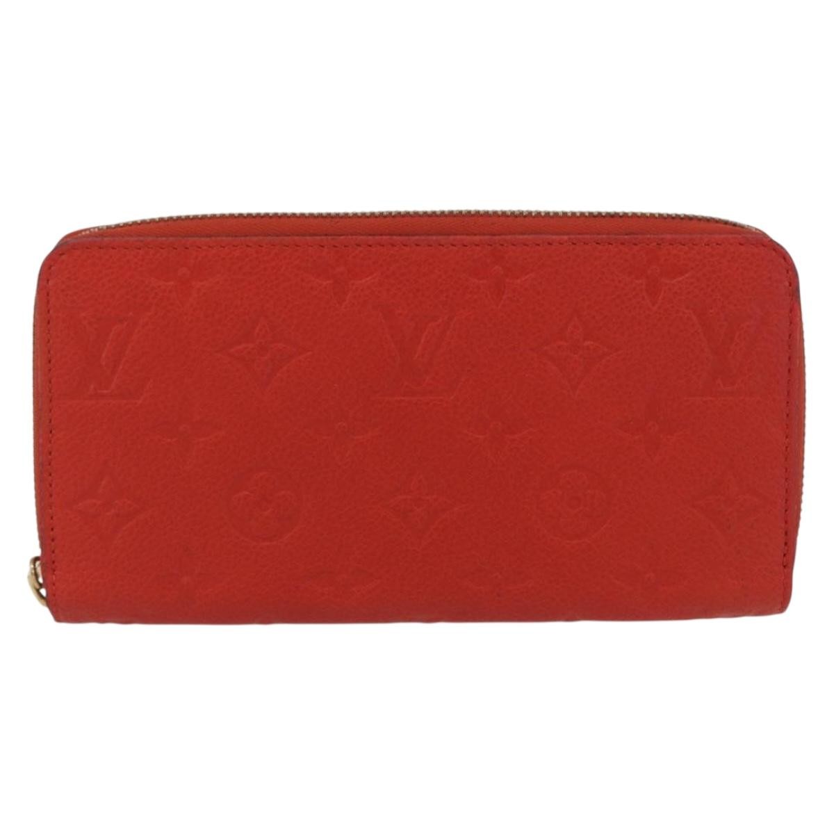 Louis Vuitton Portefeuille Zippy Monogramme Empreinte Monogramme Empreinte Orange Leather Wallets Accessory