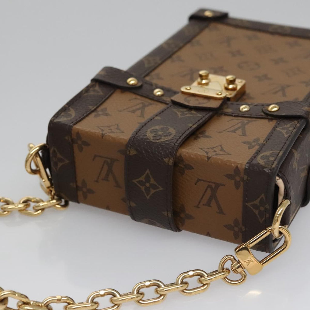Louis Vuitton Vertical Trunk Pochette Reverse Monogram Canvas Brown Canvas Clutche & Pouche Bag