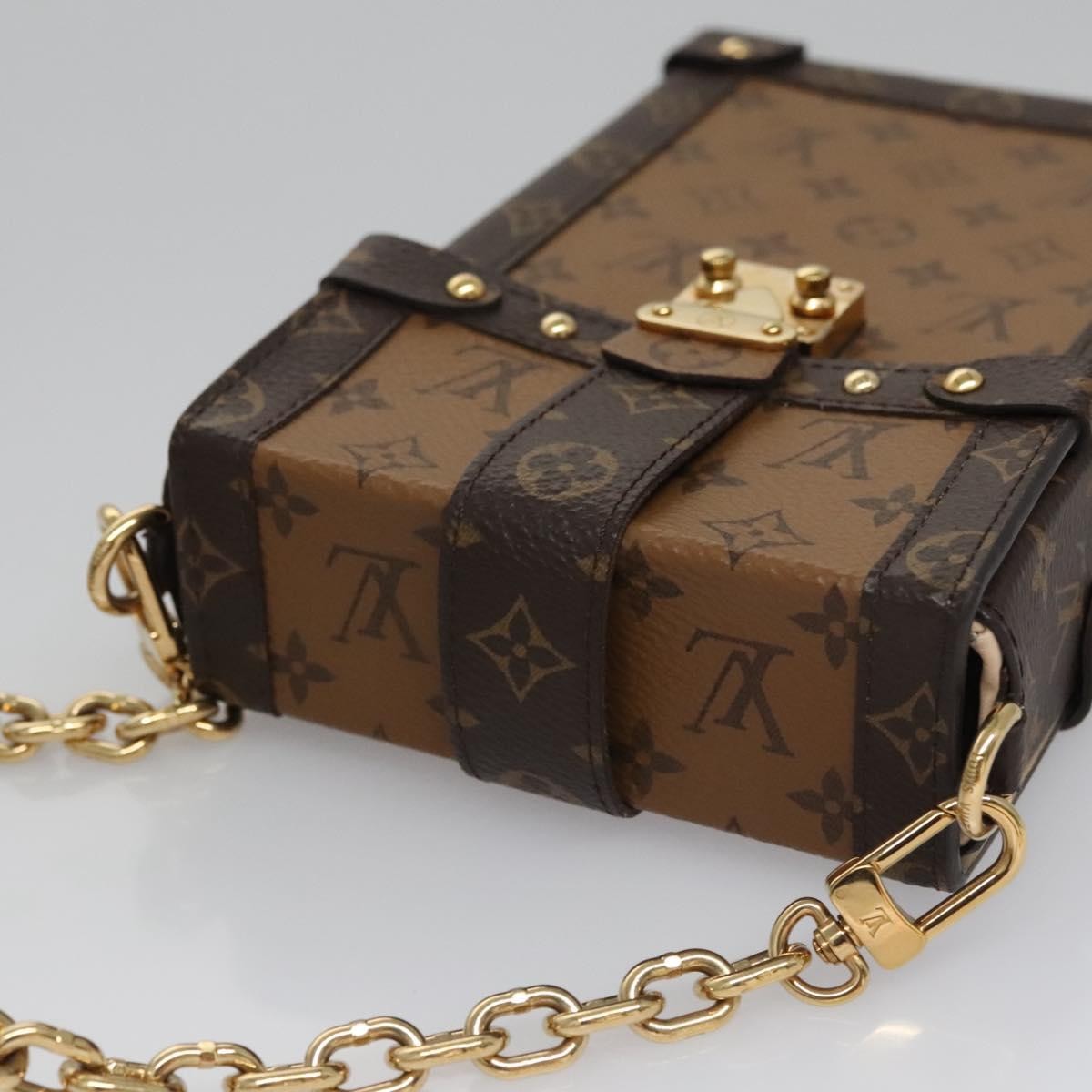 Louis Vuitton Vertical Trunk Pochette Reverse Monogram Canvas Brown Canvas Clutche & Pouche Bag