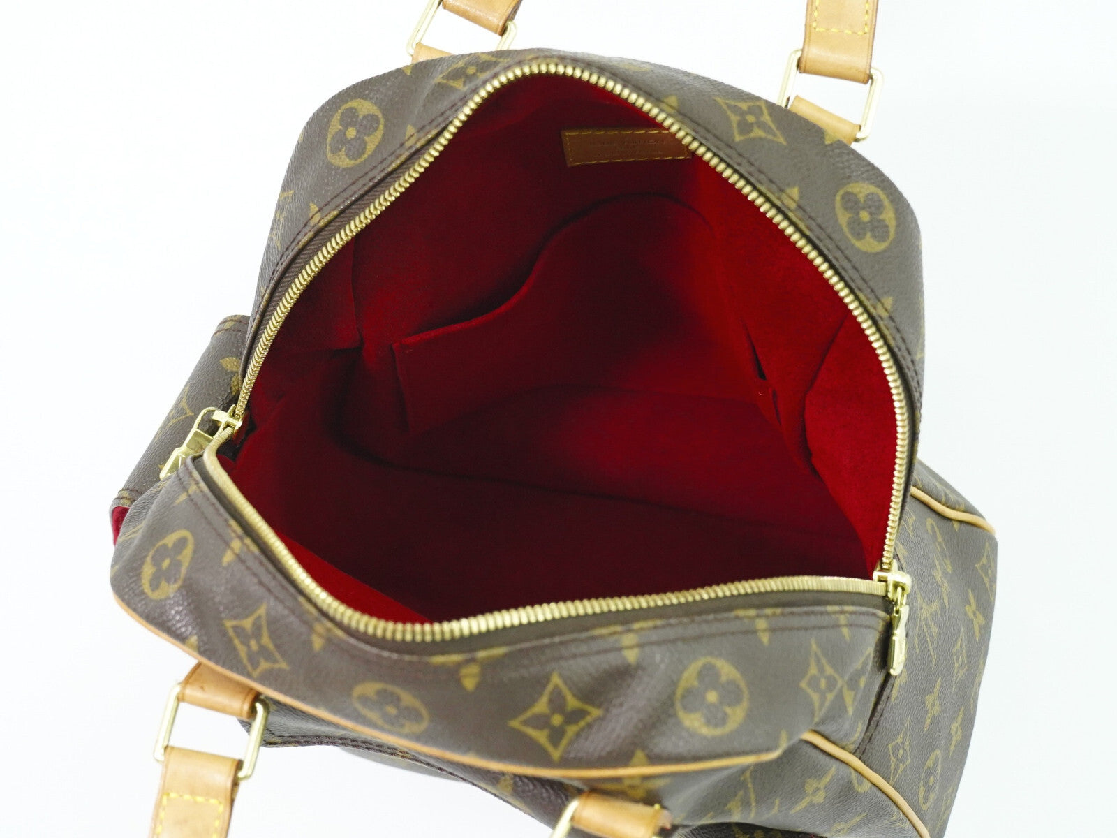 Louis Vuitton Excentri-Cite Handbag Monogram Canvas Brown Canvas Handbag