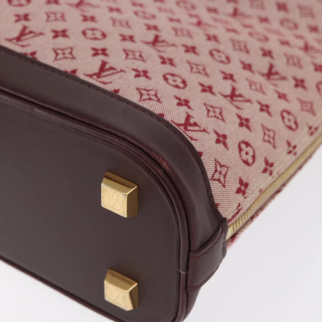 Louis Vuitton Alma Handbag Mini Lin Monogram Red Canvas Handbag
