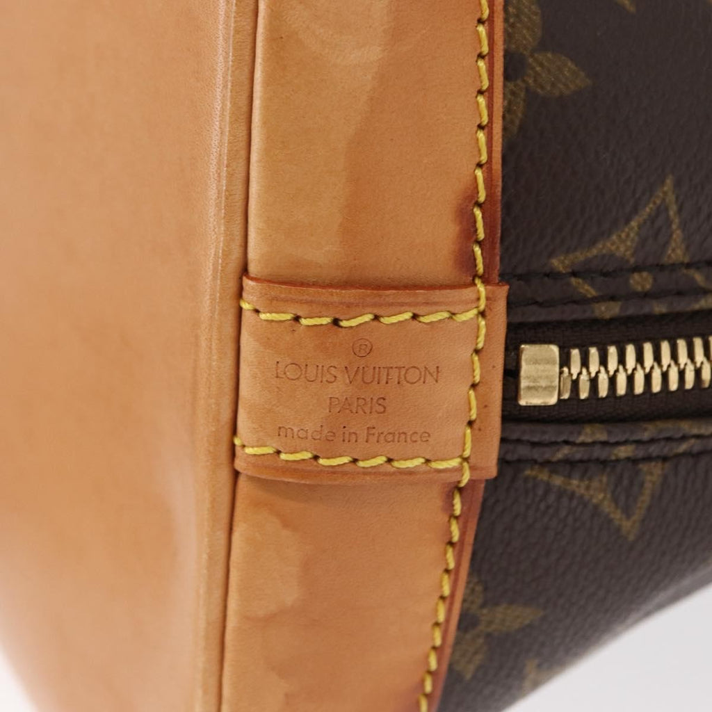 Louis Vuitton Alma Handbag Monogram Canvas Brown Canvas Handbag