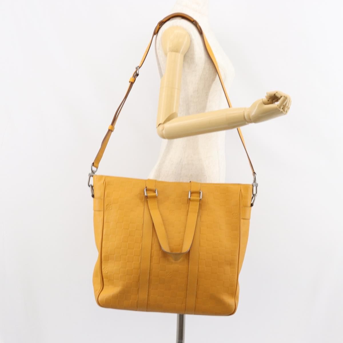 Louis Vuitton Tadao Handbag Damier Infini Leather Yellow Leather Handbag