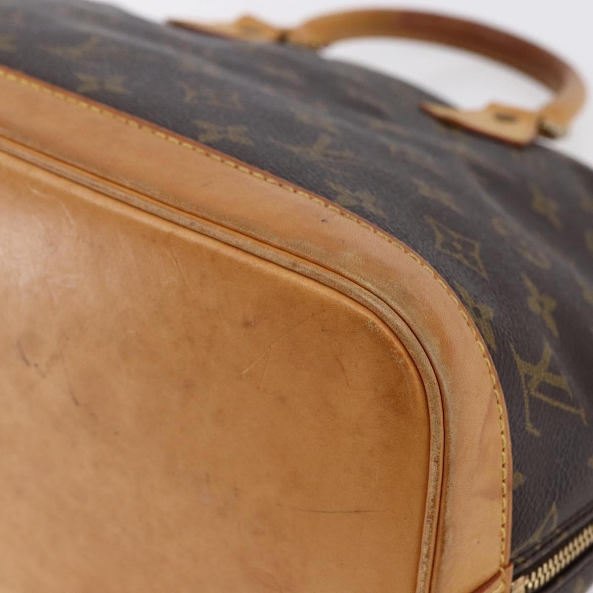 Louis Vuitton Alma Handbag Monogram Canvas Brown Canvas Handbag
