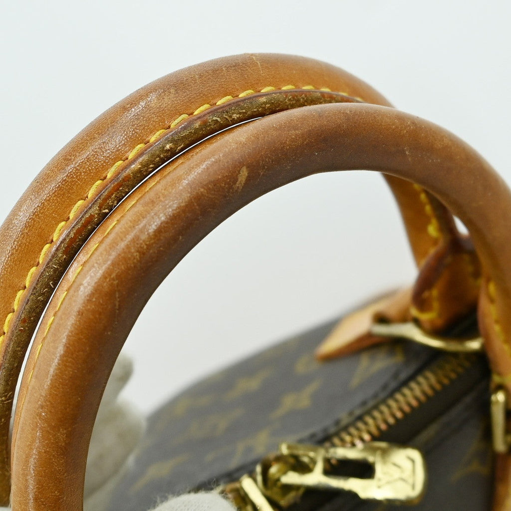Louis Vuitton Alma Handbag Monogram Canvas Brown Canvas Handbag