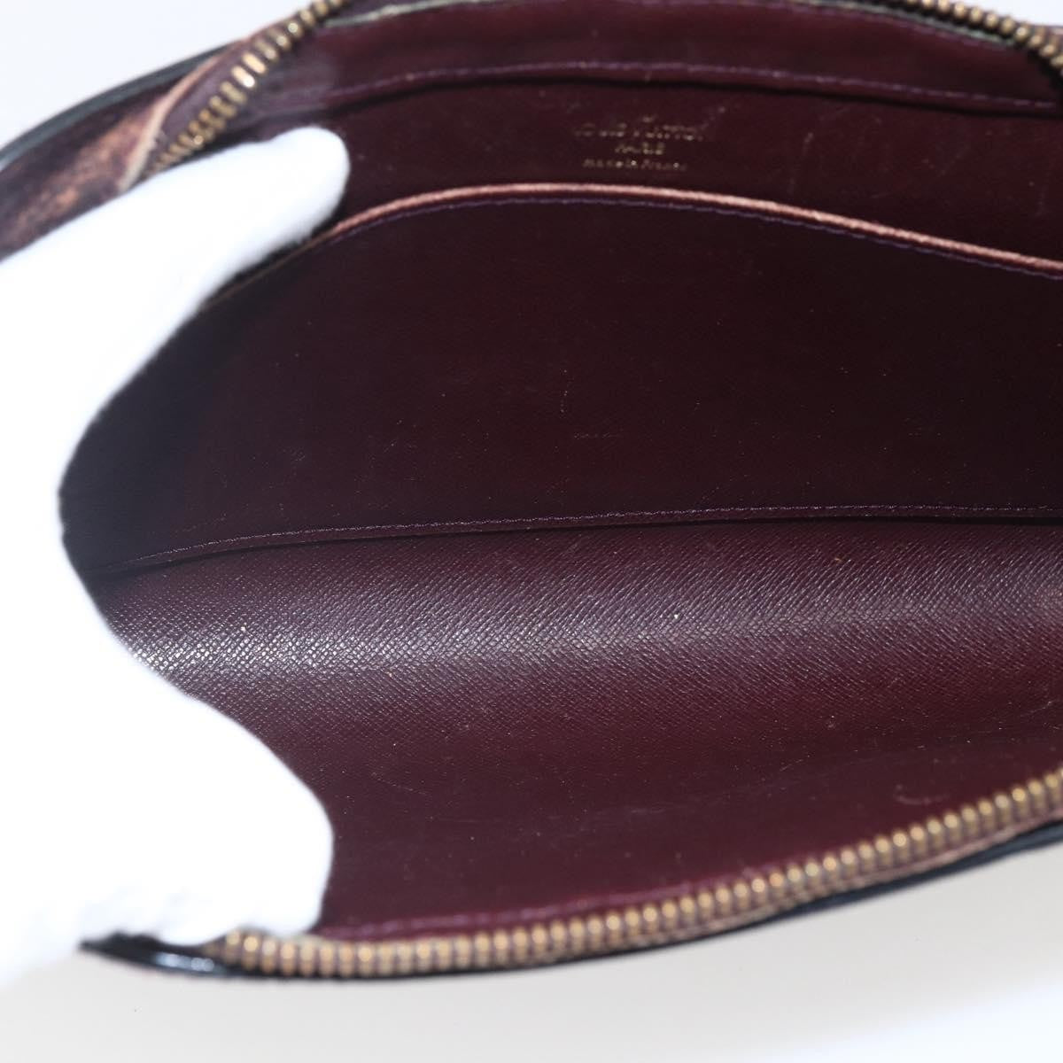 Louis Vuitton Pochette Baikal Clutch Taiga Leather Burgundy Leather Clutche & Pouche Bag