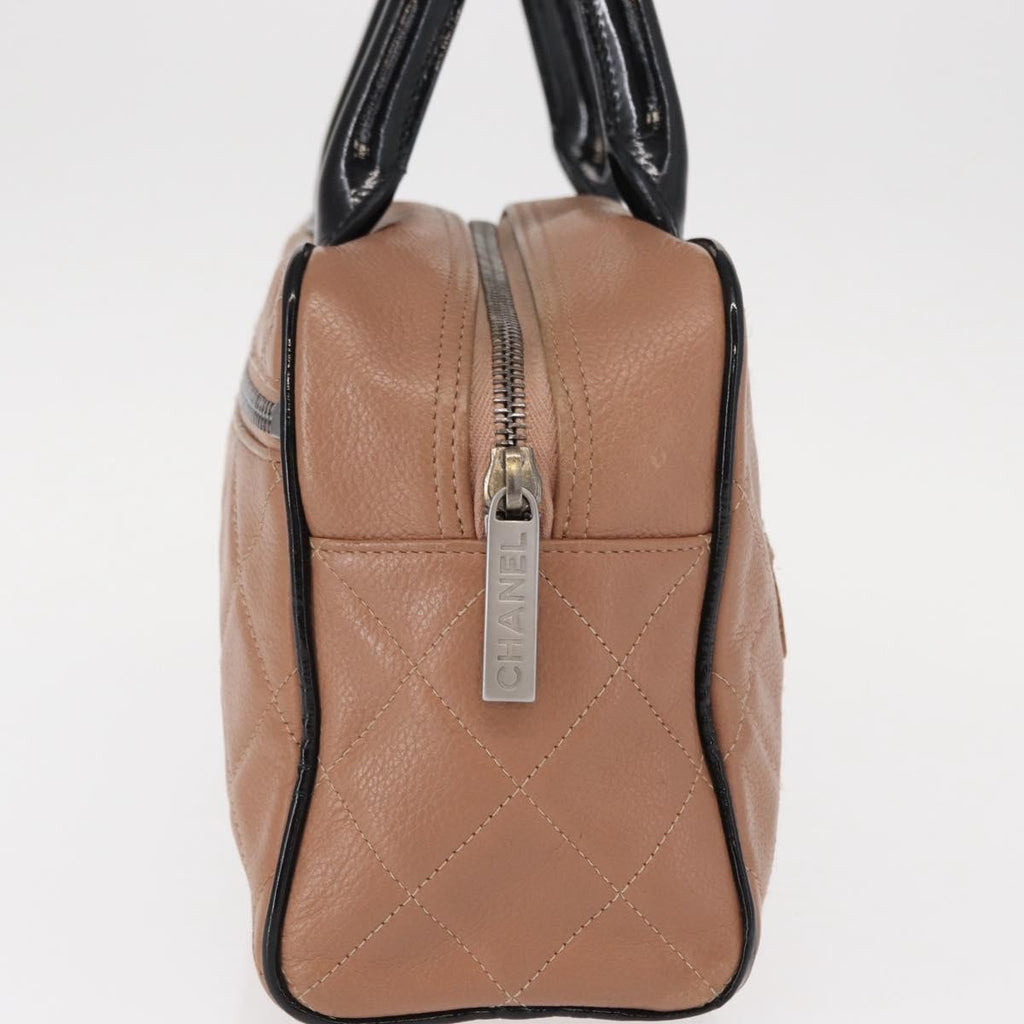 Chanel Embossed Logo Bowler Bag Quilted Caviar Beige Leather Handbag