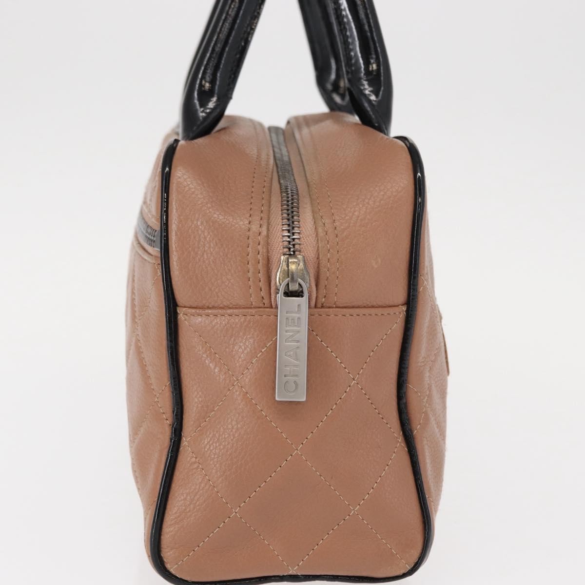 Chanel Embossed Logo Bowler Bag Quilted Caviar Beige Leather Handbag