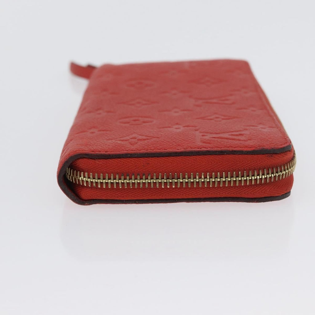 Louis Vuitton Portefeuille Zippy Monogramme Empreinte Monogramme Empreinte Orange Leather Wallets Accessory