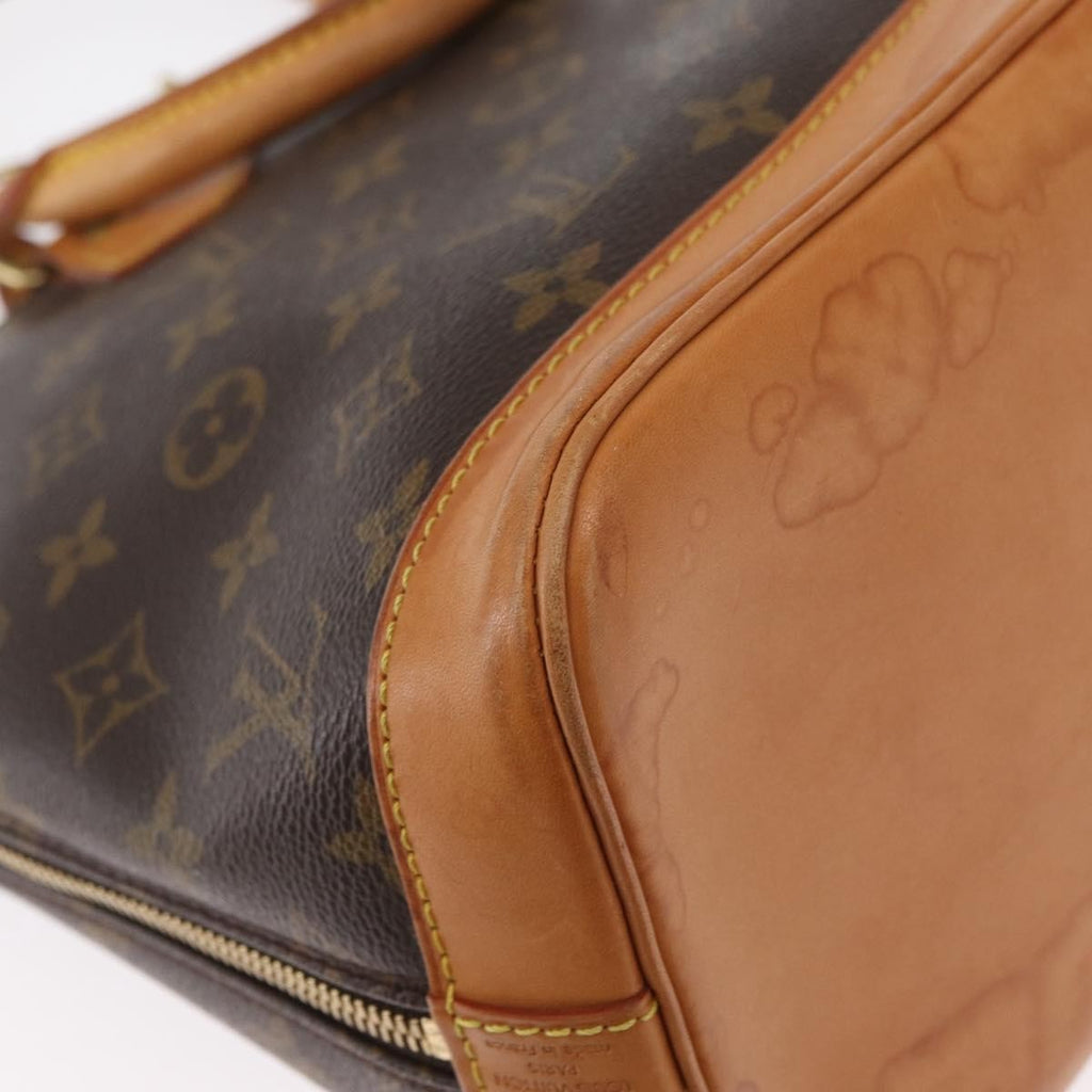 Louis Vuitton Alma Handbag Monogram Canvas Brown Canvas Handbag