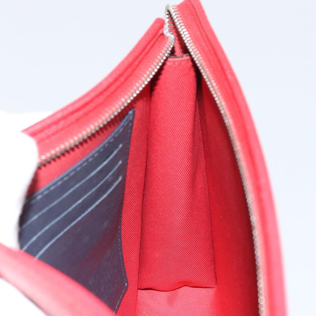 Louis Vuitton Pochette Voyage Taiga Leather Red Leather Clutche & Pouche Bag