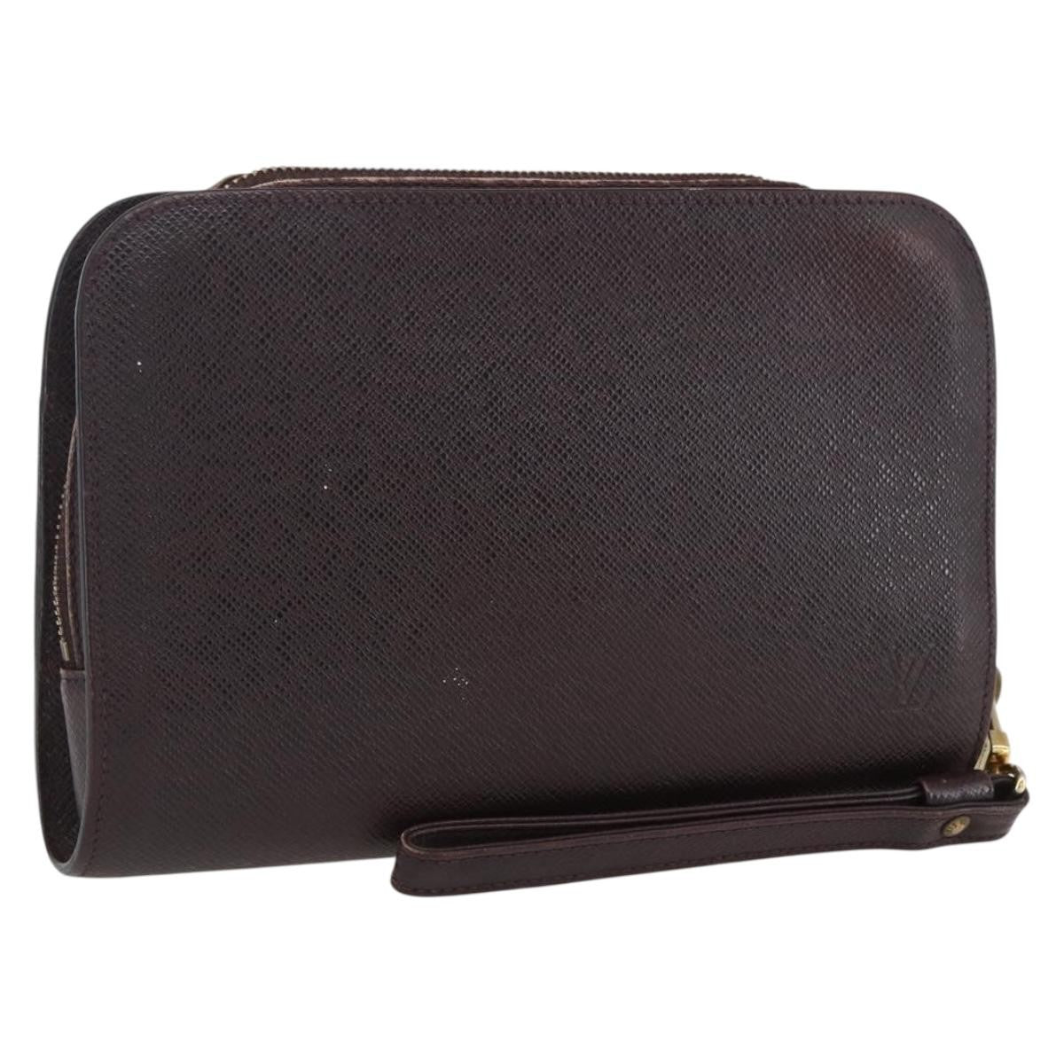 Louis Vuitton Pochette Baikal Clutch Taiga Leather Burgundy Leather Clutche & Pouche Bag