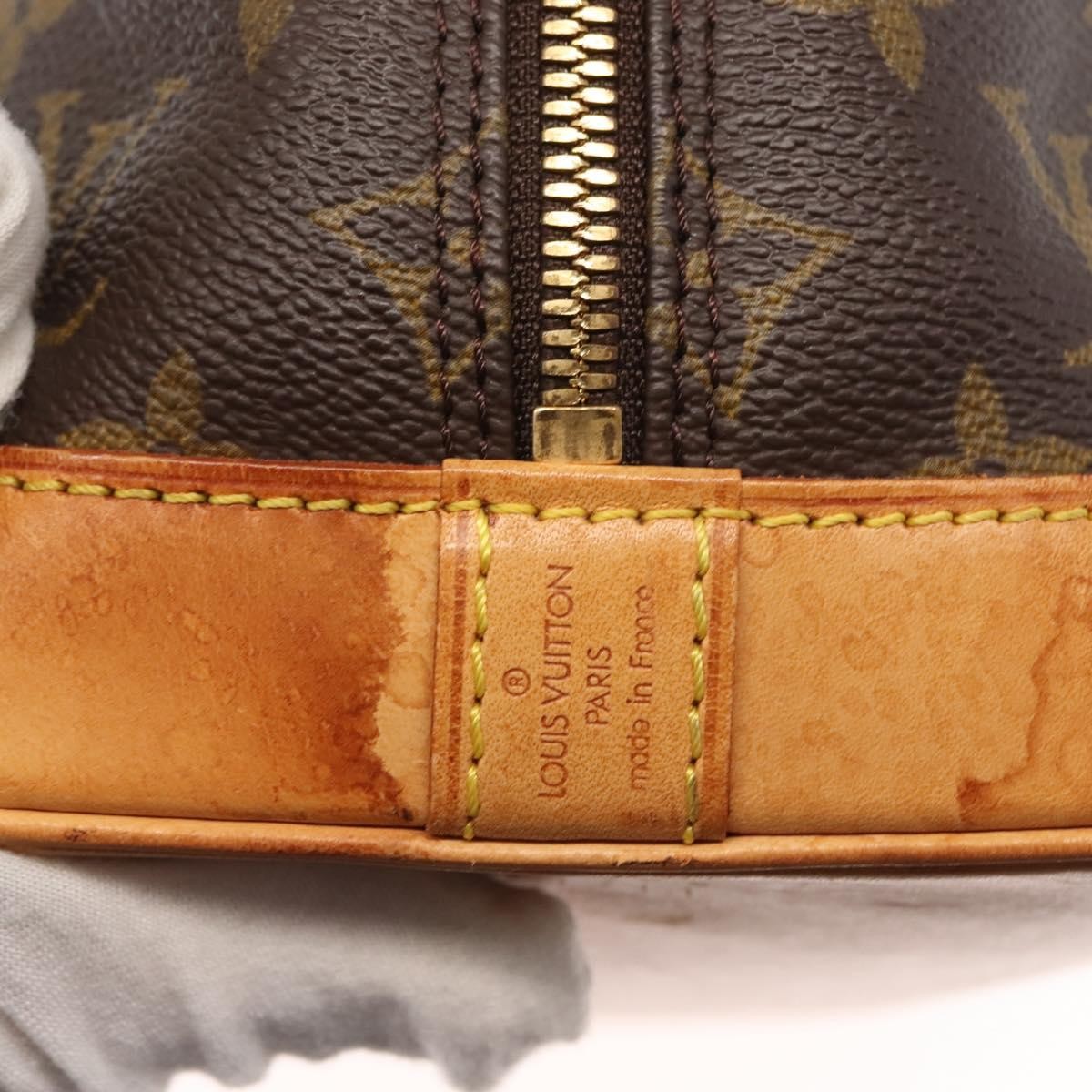 Louis Vuitton Alma Handbag Monogram Canvas Brown Canvas Handbag