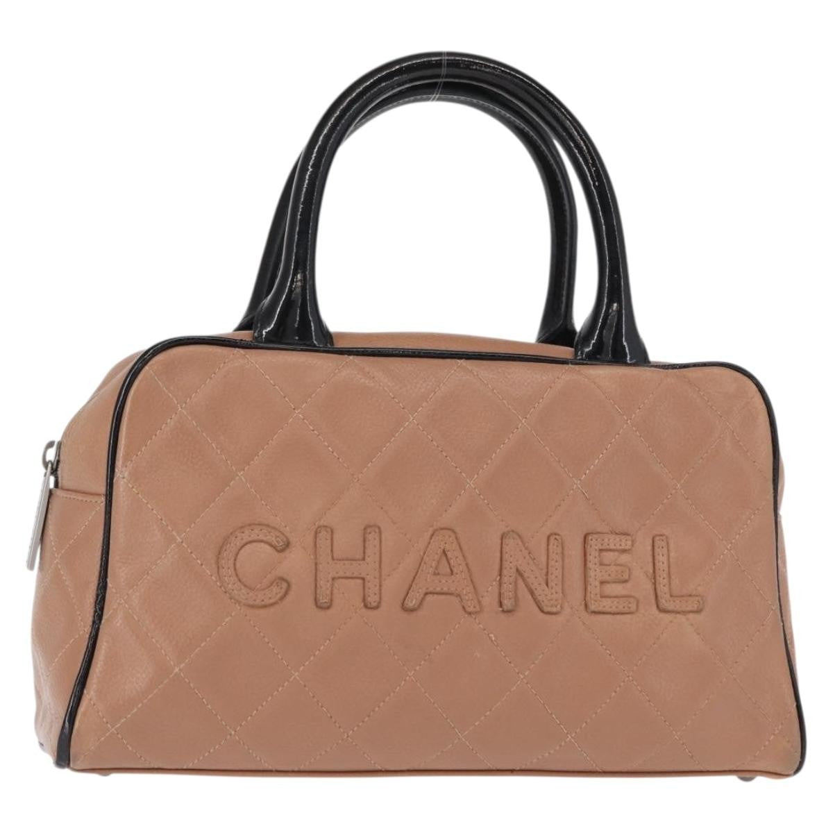 Chanel Embossed Logo Bowler Bag Quilted Caviar Beige Leather Handbag