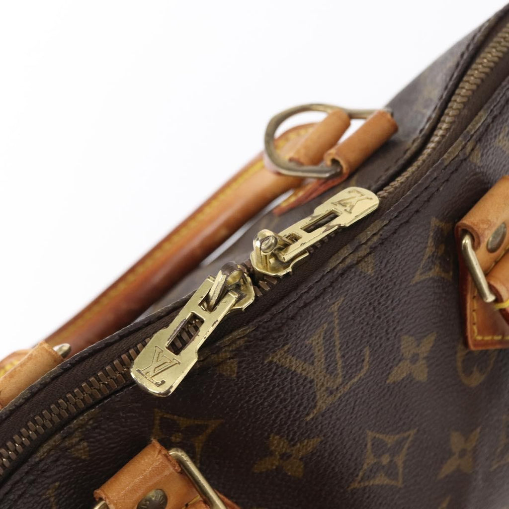 Louis Vuitton Alma Handbag Monogram Canvas Brown Canvas Handbag
