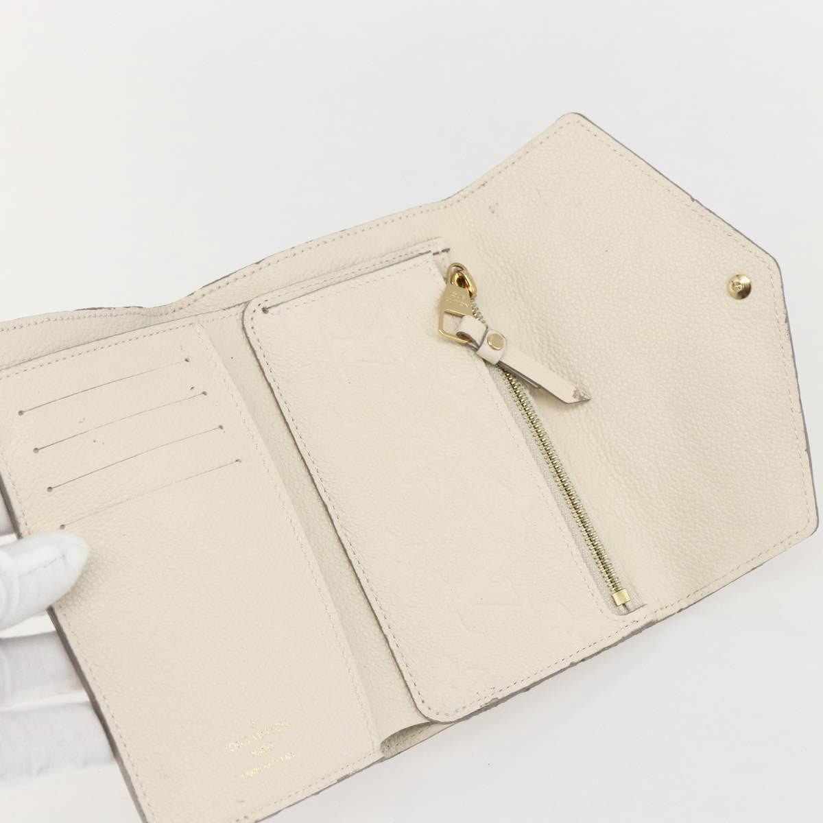 Louis Vuitton Zoe Wallet Monogram Empreinte Leather Beige Leather Wallets Accessory