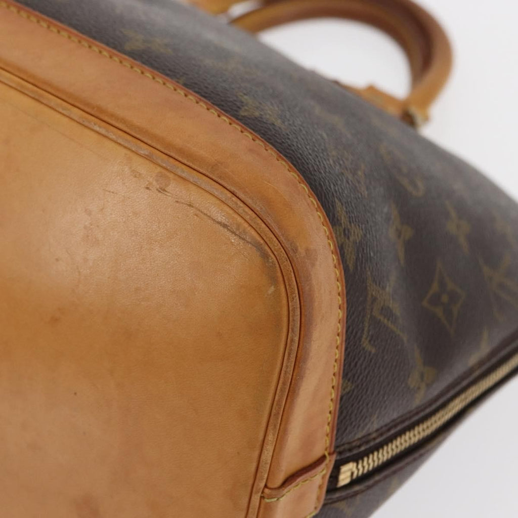Louis Vuitton Alma Handbag Monogram Canvas Brown Canvas Handbag
