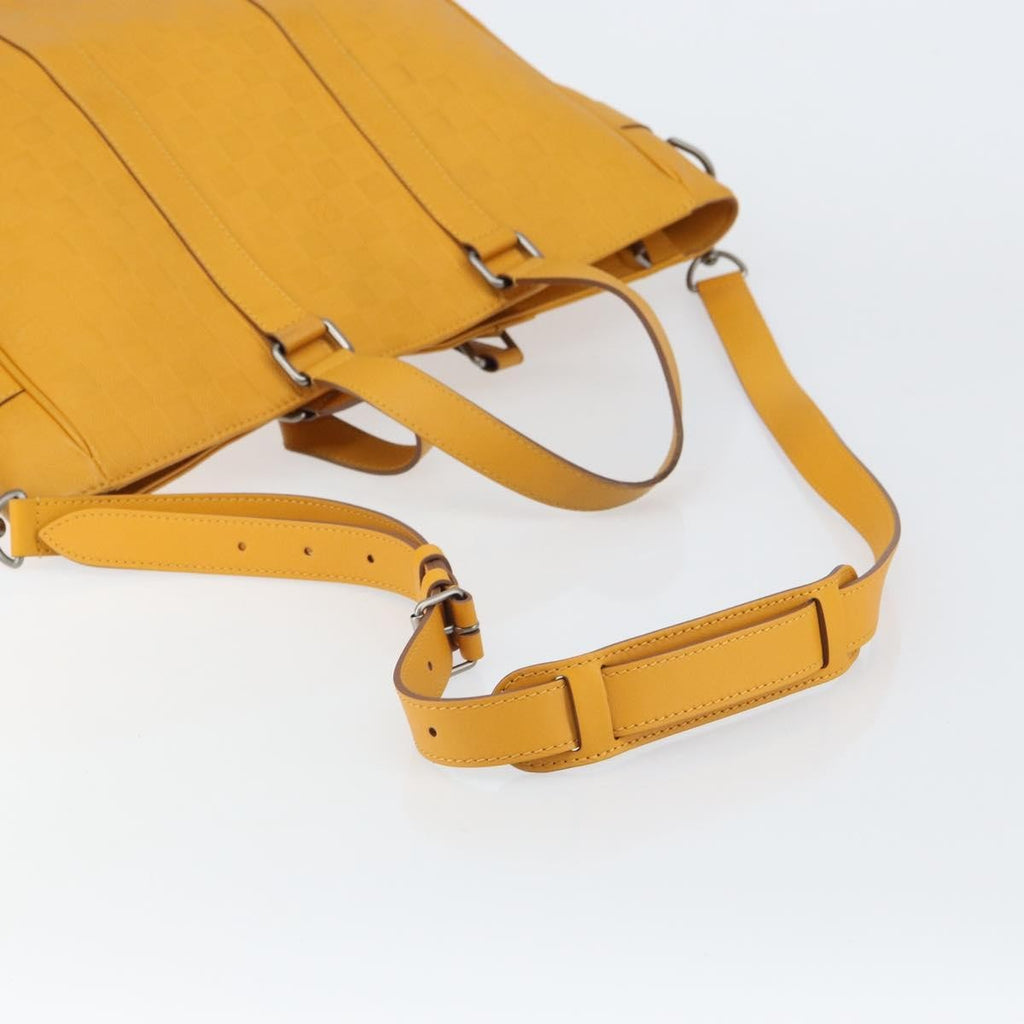 Louis Vuitton Tadao Handbag Damier Infini Leather Yellow Leather Handbag