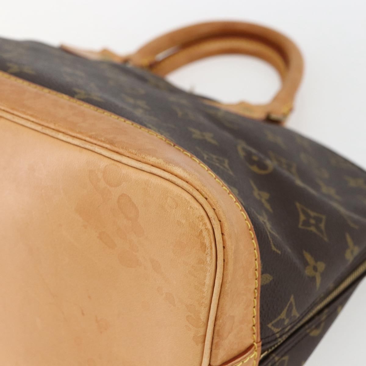 Louis Vuitton Alma Handbag Monogram Canvas Brown Canvas Handbag