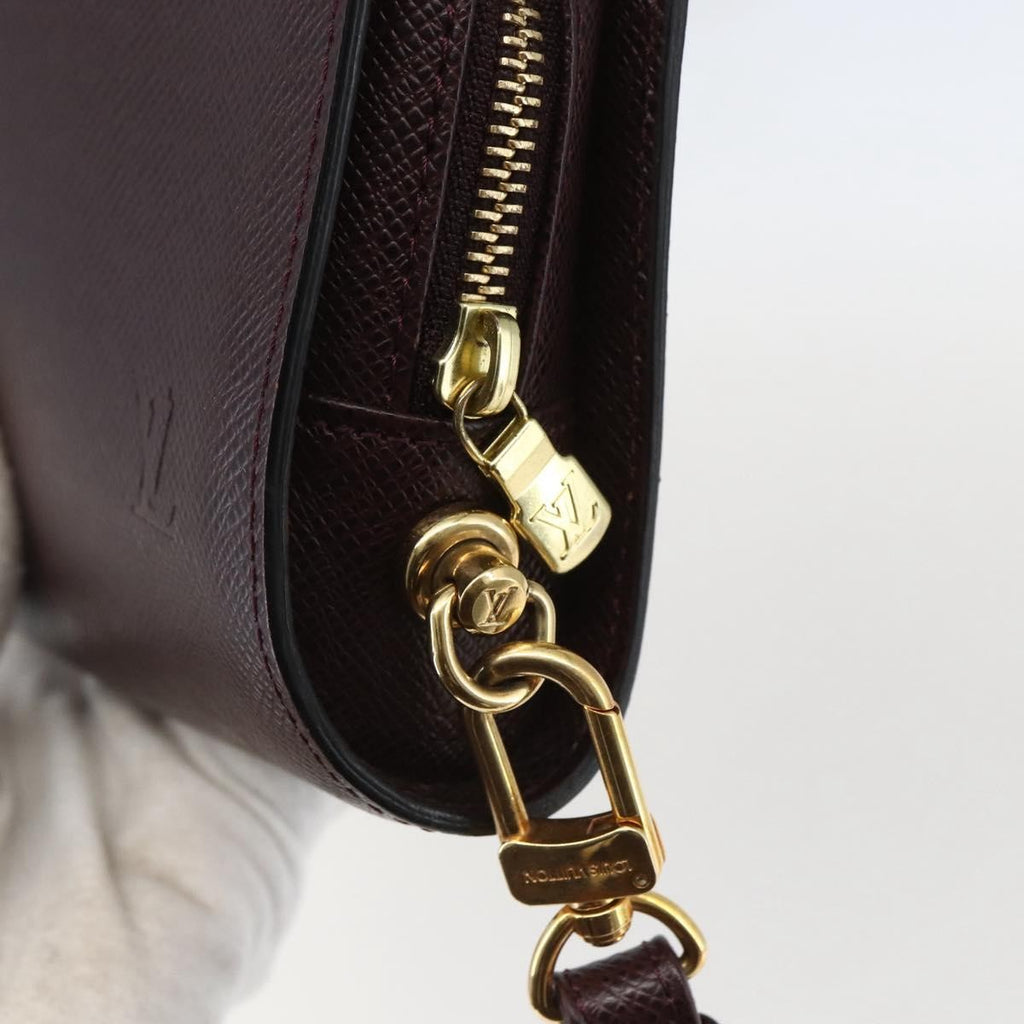Louis Vuitton Pochette Baikal Clutch Taiga Leather Brown Leather Clutche & Pouche Bag