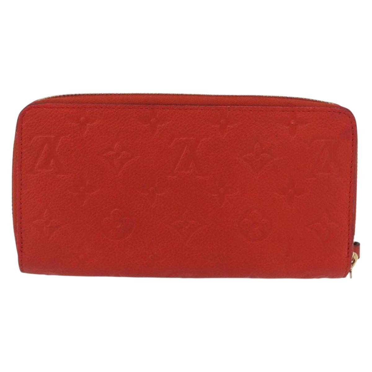 Louis Vuitton Portefeuille Zippy Monogramme Empreinte Monogramme Empreinte Orange Leather Wallets Accessory